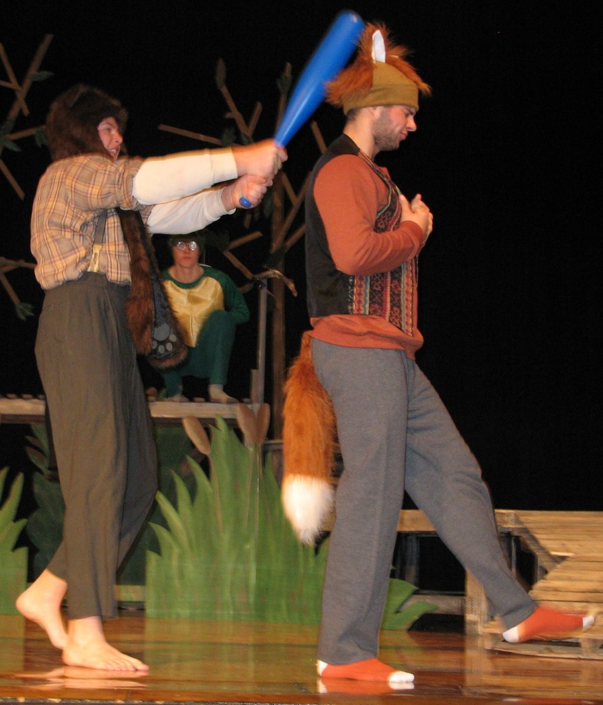 THE SLAPSTICK COMEDY duo of Brer Bear (Sam Grev) and Brer Fox (Josh Grev) keep failing to "outfox" Brer Rabbit. Watching them at back is Brer Tarrypin (Zach Fredericksen).