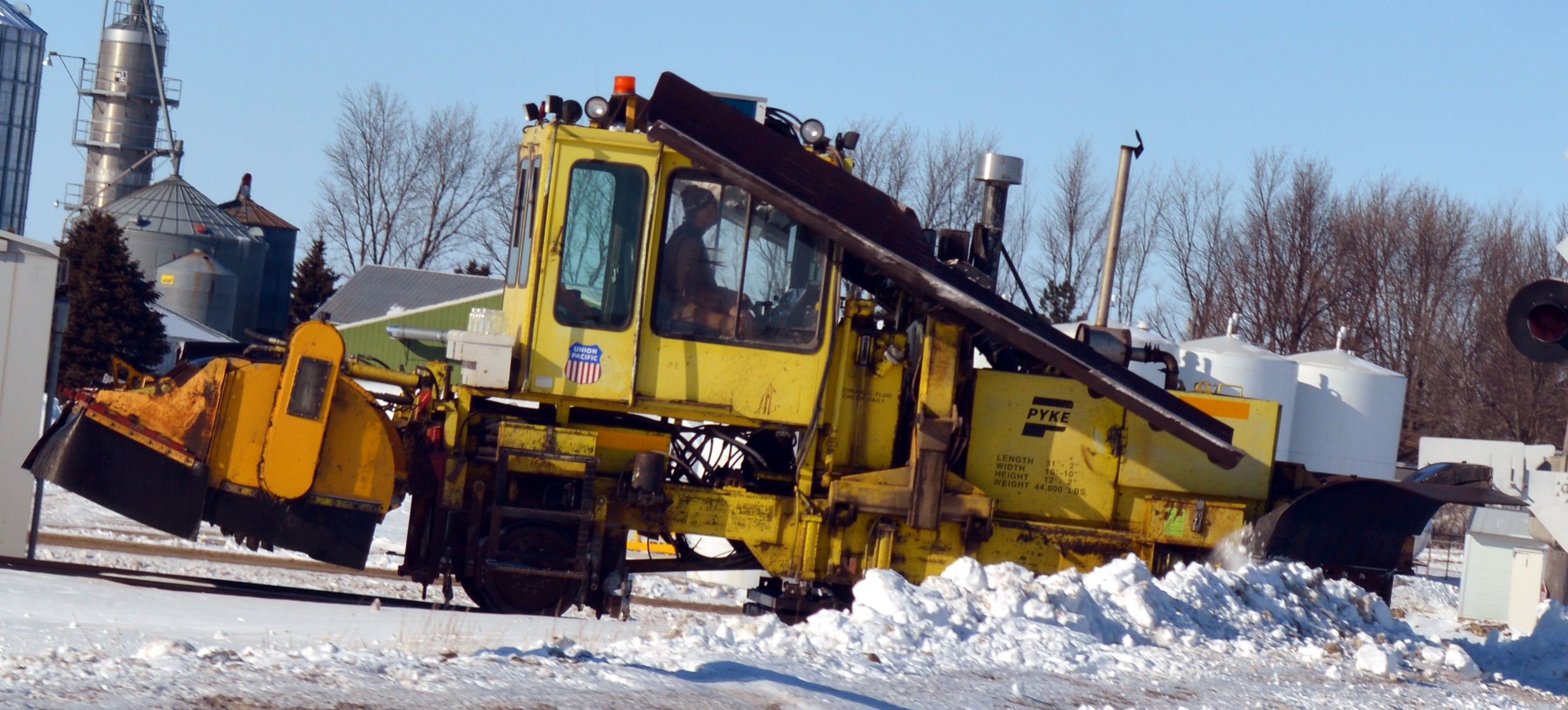 THIS UNION PACIFIC Railroad took as Sunday afternoon stroll - or, is it a roll - clearing snow off area railroad tracks accumulated from the recent snowfall and prairie blizzard winds.