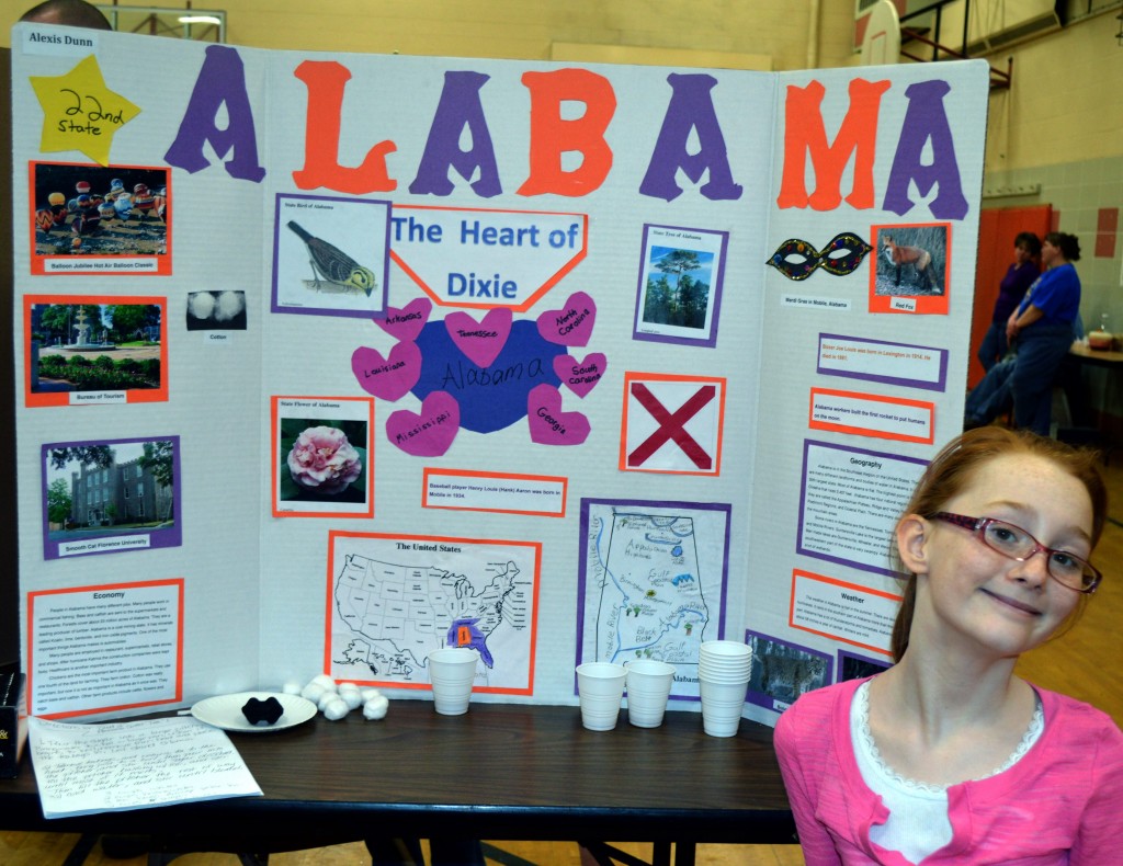 ALEXIS DUNN'S ALABAMA display featured a taste of (and recipe for) "Good Ol' Alabama Sweet Tea!" The most interesting thing Alexis learned was that cotton is grown in Alabama - and is turned into clothing.