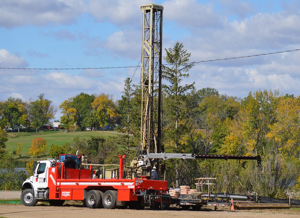 In the photographs below, Thein Well Company workers begin the drilling.  