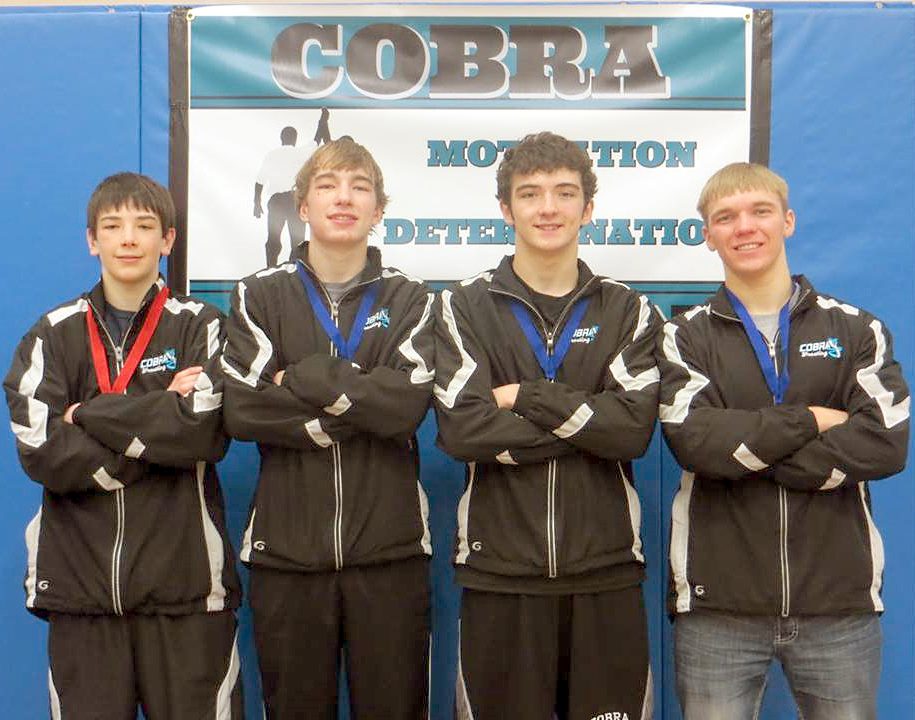 THESE FOUR COBRA wrestlers are headed to the state tourney. From left, Zach Spinks, Wyatt Stevens, Joe Fischenich and Jared Willaby. (Photo courtesy of Windom/Mountain Lake Cobra Wrestling)